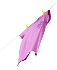 One violet t-shirt drying on washing line isolated on white