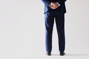 Obraz na płótnie Canvas Businessman in leather shoes on white background, closeup
