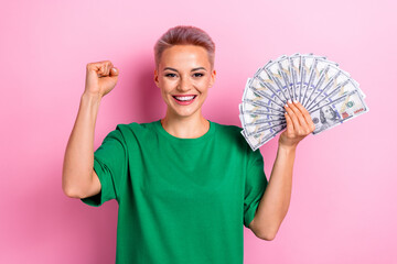 Photo of cheerful glad positive woman wear green trendy clothes celebrate win million isolated on pink color background - obrazy, fototapety, plakaty
