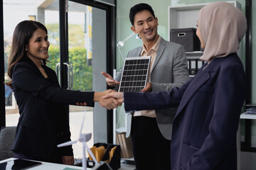 Successful business meeting, excited young person Keeping up arms and showing positive emotions, happy working in modern office.