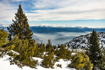 Ski resort Paganella Andalo, Trentino-Alto Adige, Italy. Ski slopes and snow holidays in Andalo in the Italian Dolomites, ski resort in the Alps. Snow covered Italian Dolomites at winter.