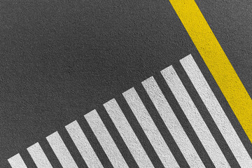 Crosswalk top view on asphalt background Safety driving concept.