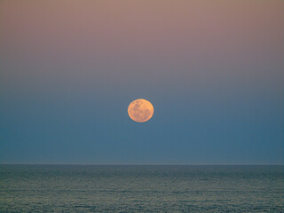full moon over the sea