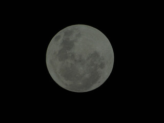 full moon over black