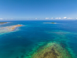 Blue sea and coral reef, Jobo Island in Britania Island. Mindanao, Philippines.