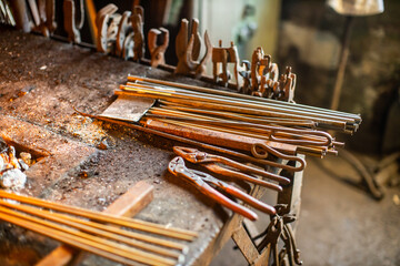 blacksmith workshop tools and metal ready for crafting