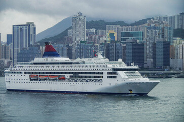 Classic cruiseship cruise ship liner Pisces arrival into Victoria Harbor in Hong Kong Honkong,...