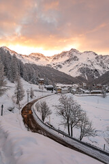 Beautiful sunrise over snowy mountain peaks in Sulden the European Alps