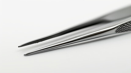 tweezers on white background