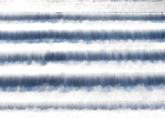 Wave foam in front of the floodgates