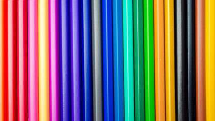 Set of colored pencils on a white background That is arranged in a bar graph, Color pencils on white background, Close up, seamless colored pencils row with wave on lower side, line pencils.