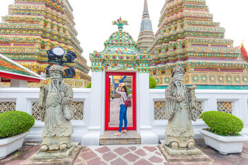 Beautiful tourist asian woman backpack travel walking in buddha temple sightseeing - 752297171