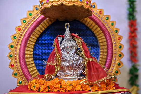 Lakshmi pujan - godess laxmi idol, Copper Kalash, coconut with Red accounting note book and haldi kumkum, laxmi mata ji religious goddess,	