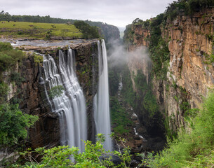 The Magwa Falls waterfall, Wild Coast, known also as the Transkei, long tropical beach rocky shores waterfalls and steamy jungle or coastal forests. The rugged and unspoiled Coastline