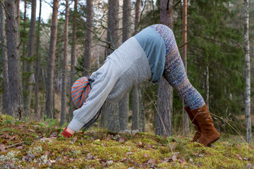 Yoga pose in the forest