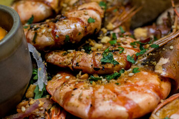 Delicious grilled shrimp served with garlic and parsley in a cozy restaurant