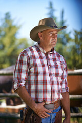 Farm, thinking and senior cowboy on ranch with lasso for horse, cows and rodeo animals for...