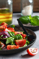 fresh salad with cherry tomatoes and basil