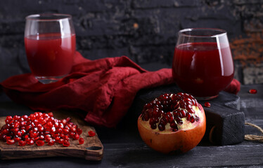 fresh natural organic pomegranate on wooden table