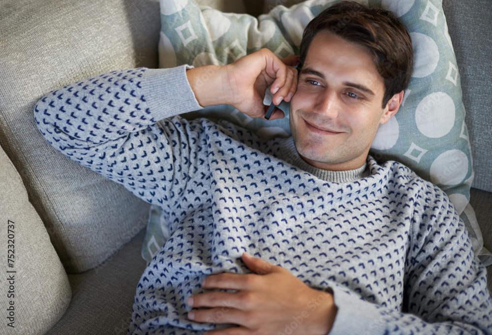 Aufkleber smile, phone call and top view of man in home on sofa for conversation, chat or listening to contact