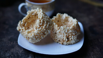 Reginang or rangginang is a cracker from Indonesia. Rengginang is made from steamed glutinous rice and seasoned and dried, last fried rengginang until cooked.