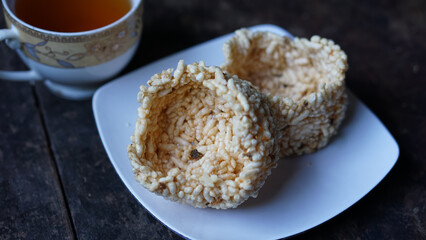 Reginang or rangginang is a cracker from Indonesia. Rengginang is made from steamed glutinous rice and seasoned and dried, last fried rengginang until cooked.