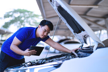 Professional mechanics in the service center check the safety of the car. Repair service concept Professional service concept.

