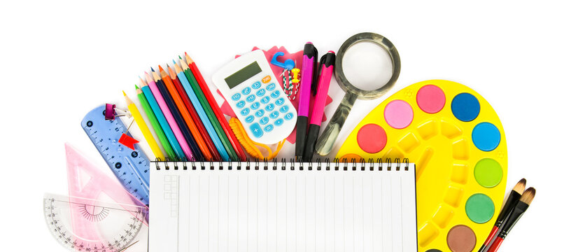 Set of stationery and school supplies isolated on a white. There is free space for text. Wide photo.