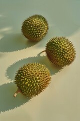 Durians on plain background.