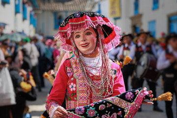 Dancers in traditional costumes at the festivity of the Virgen del Carmen, Paucartambo square,...
