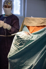neurosurgeon , doing surgery, operation theater, subdural hematoma in the brain, multiple...