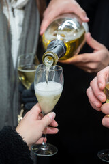 Visitors drink of sparkling wine champagne on outdoor winter festival in December on Avenue de Champagne, Epernay, Champagne region, France