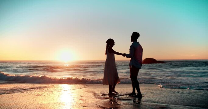 Beach, couple and sunset at ocean with running for adventure, love and summer date together with freedom. Man, woman and holding hands by water for holiday, romance and vacation weekend in Greece