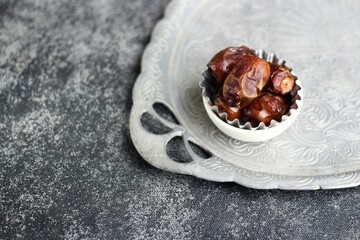 Dates or Dried Dates on silver tray
