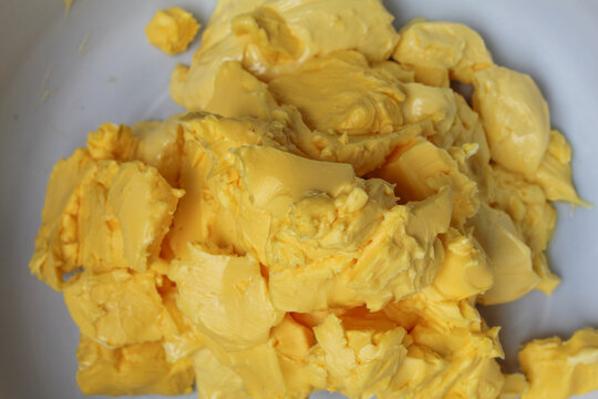 Bakery margarine texture on white background