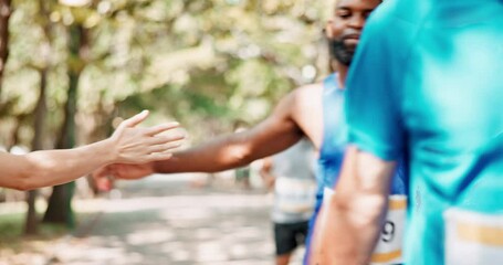 High five, marathon and running with race, competition and exercise for wellness, sports and endurance. People, athletes or group of runners in workout or training with fitness, support or motivation