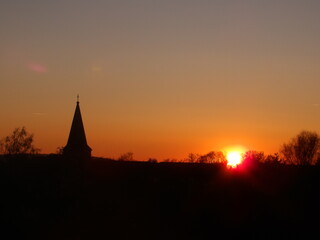 Fototapeta na wymiar Church steeple at sunset