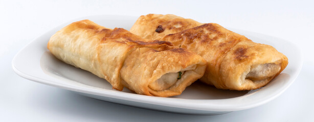 deep fried phyllo pastry with pastrami and tomato filling