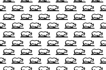 Seamless pattern completely filled with outlines of wild rhino symbols. Elements are evenly spaced. Vector illustration on white background