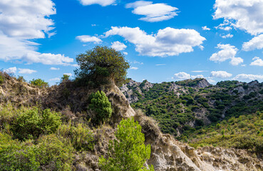 view of Aliano badlands (calanchi), landscape made of clay sculptures eroded by the rainwater, Basilicata region, southern Italy