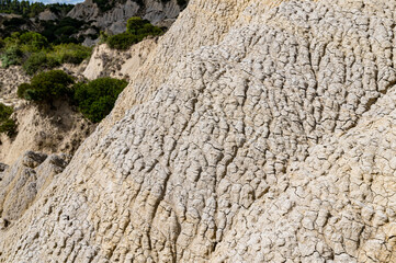 view of Aliano badlands (calanchi), landscape made of clay sculptures eroded by the rainwater, Basilicata region, southern Italy