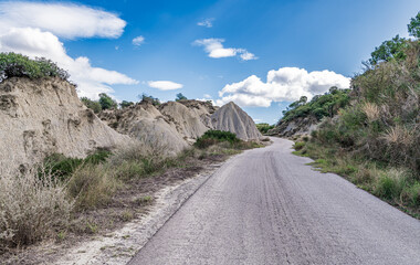 view of Aliano badlands (calanchi), landscape made of clay sculptures eroded by the rainwater, Basilicata region, southern Italy