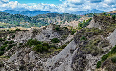 view of Aliano badlands (calanchi), landscape made of clay sculptures eroded by the rainwater, Basilicata region, southern Italy