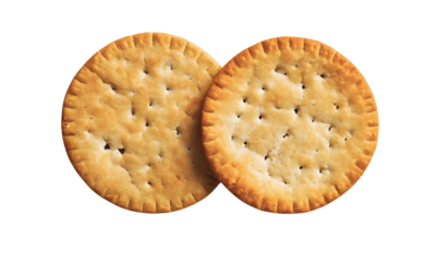 Two pieces of Round various organic crispy corn crackers with sesame and salt isolated on white or transparent  background. png.