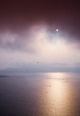 Misty sunset over aegean sea, copy space. © Raquel