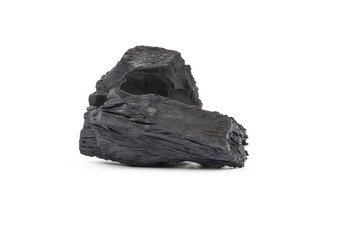 Natural wood charcoal, traditional charcoal or hardwood charcoal isolated on white background. For heating food in cooking.  cosmetics. deodorant in the refrigerator. Activated Carbon. BBQ.