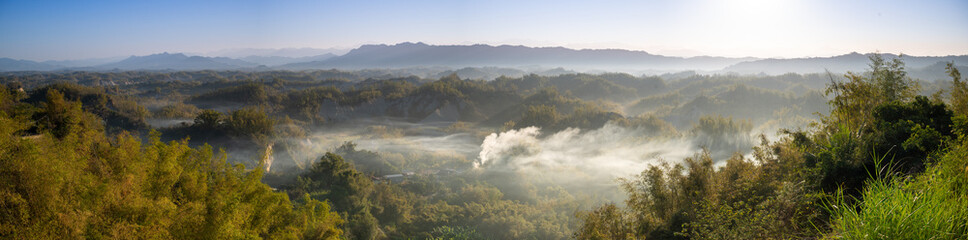 In the morning, smoke curls up from the valley and the bamboo forest is green. The Erliao tribe in...