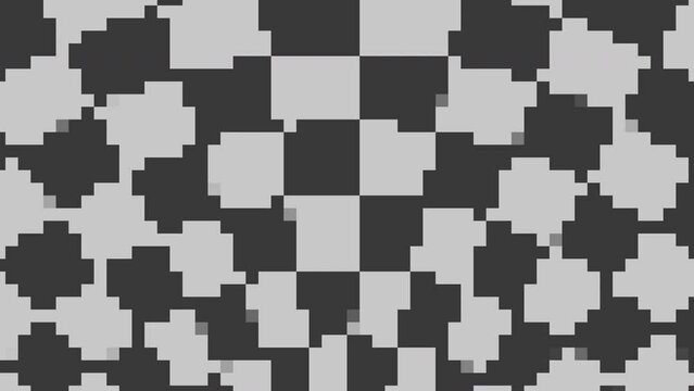 A black and white checkerboard pattern made up of squares of varying shades creates an intriguing visual effect in this image