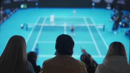 Cheering Tennis Fans Celebrating at a Sports Arena