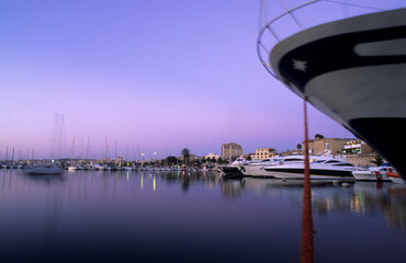 boats at the dock at sunset, Portof Alghero, Sardinia, Italy